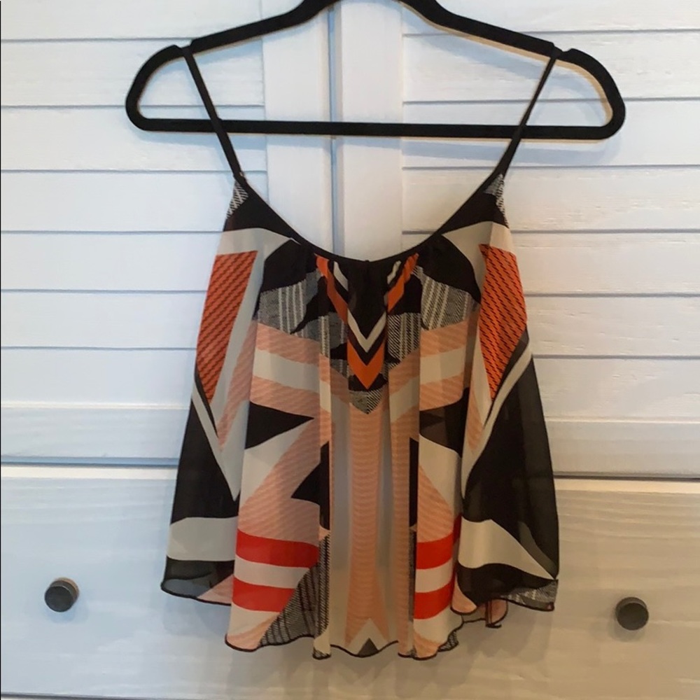 Orange and black geometric blouse